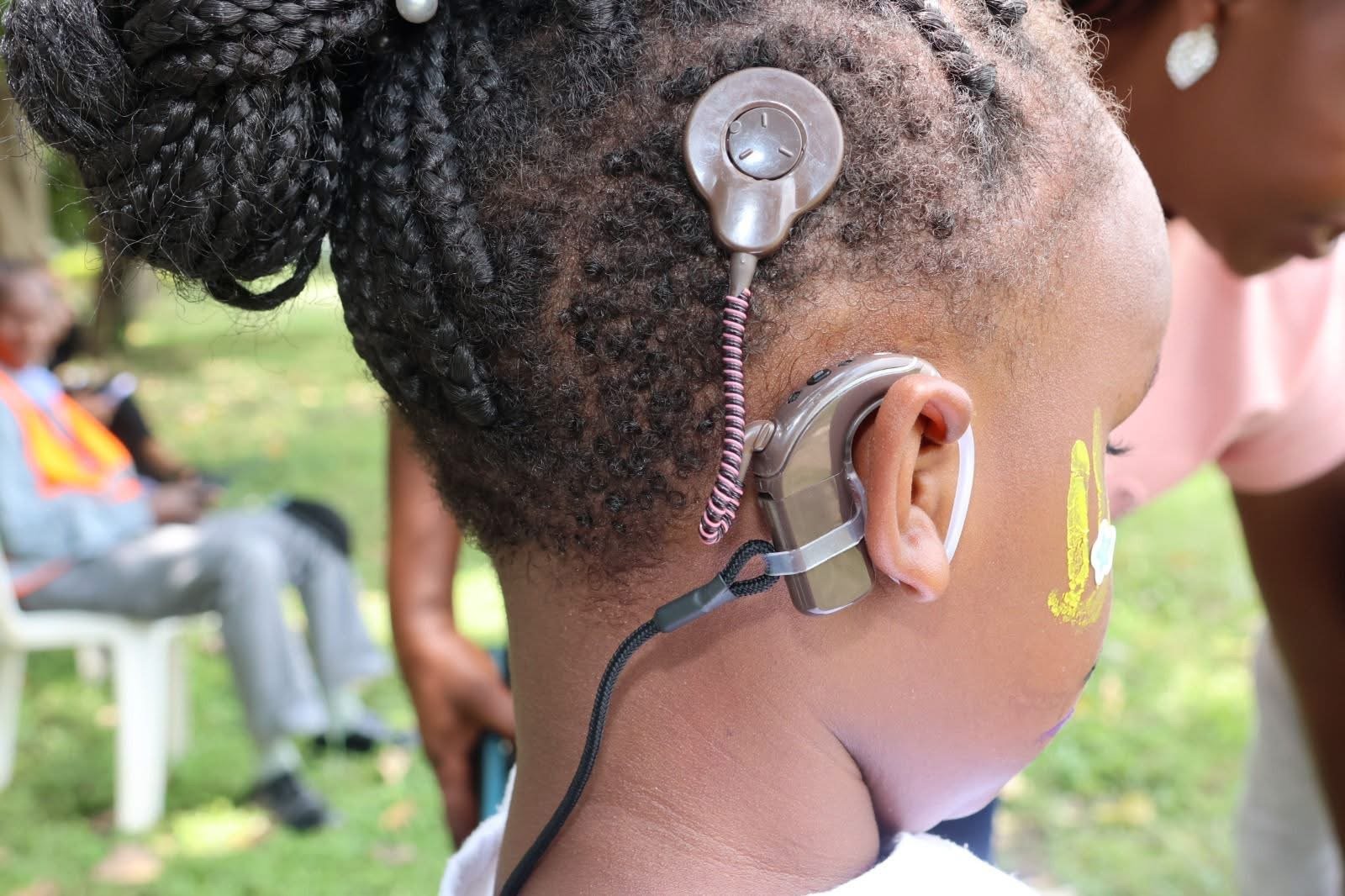 Child with cochlear implant at Kids Speak AVT session